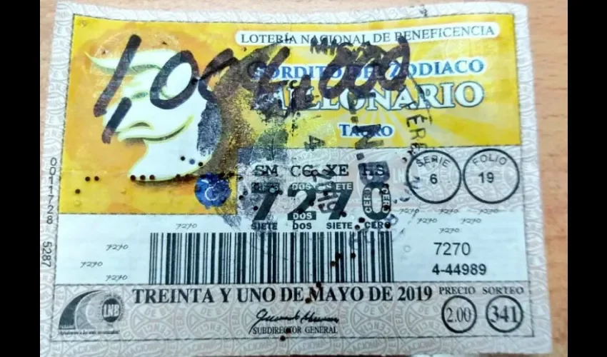 Foto ilustrativa de billete ganador. 